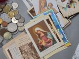 a lot of cards and coins on the table