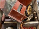 a box full of assorted items sitting on the floor