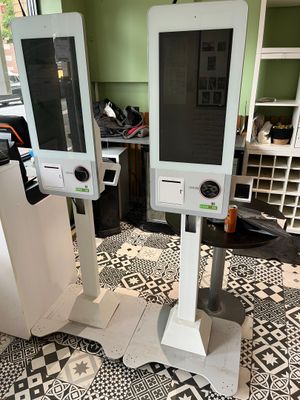 two monitors that are sitting on top of each other