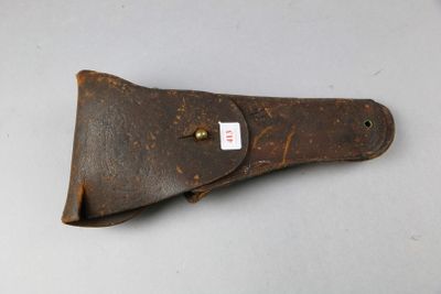 an old leather sheath with a tag on it