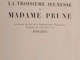 the front cover of a book with a black and white image of the title