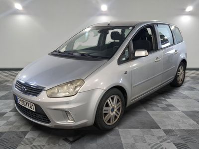 a picture of a silver car parked in a garage