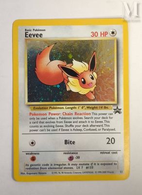 a close up of a pokemon card on a white surface