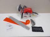 a chainsaw, a saw, and other tools on a table