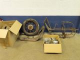 a box with a bike and a box with a motorcycle inside of it