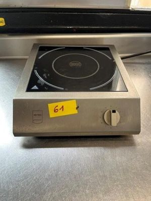 an image of a stove top with a price tag on it