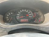 a close up of a car dashboard with a speedometer