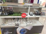 a display case with a lot of watches on it