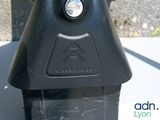 a close up of a parking meter on a sidewalk