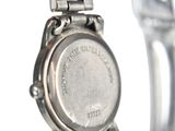 a close up of a wrist watch with a metal band