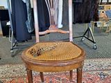 a chair that is sitting on a rug in a room