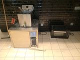 a microwave and a toaster sitting on a counter in a kitchen