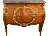 une image d'une commode avec un plateau en marbre