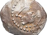 gros plan d'une pièce de monnaie sur fond blanc