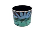 a black cup with a blue and green flower on it