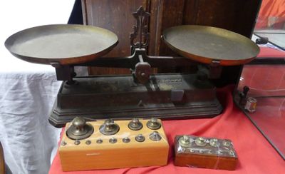 a scale that is sitting on a table with a box