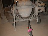 a cement mixer sitting in the middle of a building