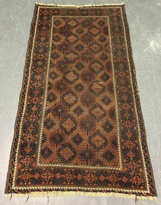 a rug with a brown and black design on it