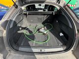 a car trunk with a bunch of wires in it