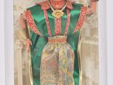 poupée Barbie dans une boîte, vêtue d'une robe verte et coiffée d'une couronne dorée