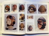 a book with pictures of various types of helmets on it