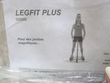 a person holding a plastic bag with a picture of a woman on a scooter