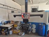 a machine that is sitting inside of a garage