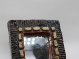 a picture of a picture of a mirror on the wall