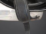 a close up of a helmet with a strap attached to it