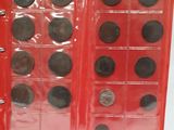 a red case with a lot of coins inside of it
