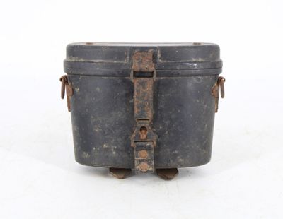 an old metal box with a handle on it