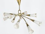an image of a chandelier with white flowers hanging from the ceiling