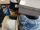 a pile of wires and other items on a pallet