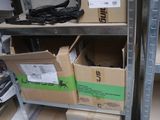 many boxes of assorted items on the shelves