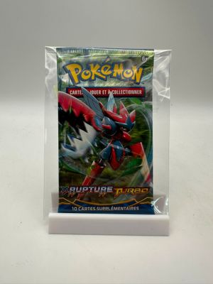 gros plan d'une boîte de cartes pokemon sur une table