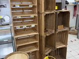 a room with a lot of shelves and a chair in it