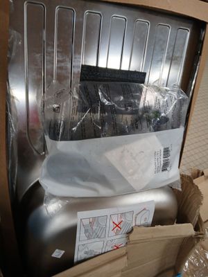 a box with a laptop inside of it on the floor