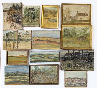 a lot of paintings hanging on the wall together
