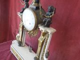 a clock that is sitting on top of a table