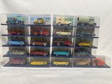a lot of toy cars that are in a display case