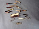 a lot of different types of knives on the table