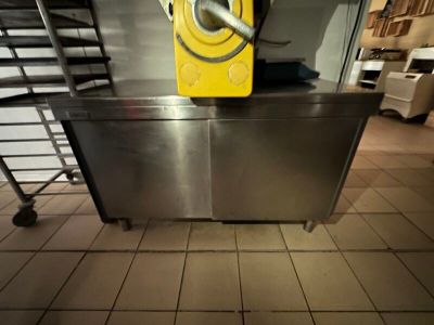 an image of a commercial kitchen with a stainless steel oven