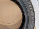 a tire that is sitting on top of a cardboard box