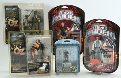 five action figures of the same character in the package