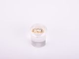 a close up of a ring on a white surface