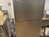 a stainless steel dishwasher in a kitchen next to a sink