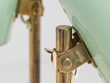 pair of green glass table lamps with brass fittings and brass fittings