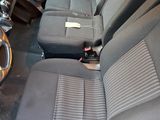 a picture of the inside of a car with the front seats down