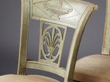 pair of antique chairs with upholstered back and upholstered seat