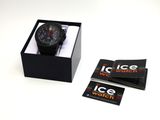 a black watch in a black box on a white surface